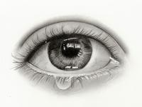 A pencil drawing of an Eye with a Tear drop